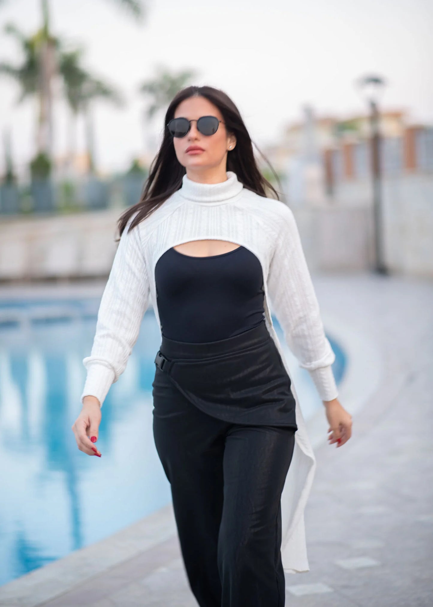 Black leather high waist cargo pants with buckle on the side