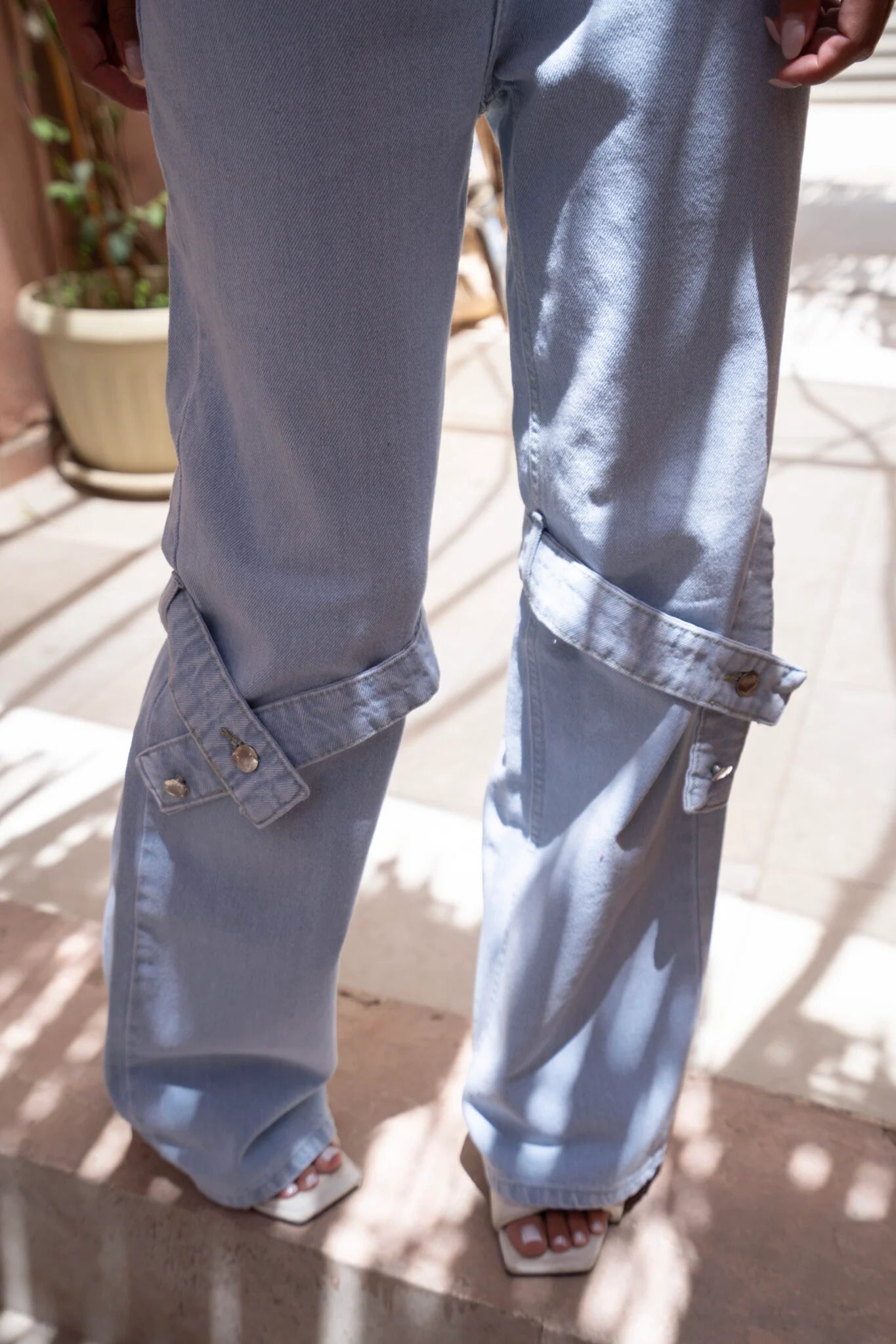High Waist Jeans with a Belt Around the Knee