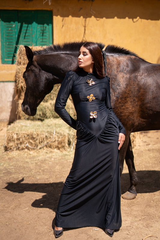 Black v waist dress with gold flowers