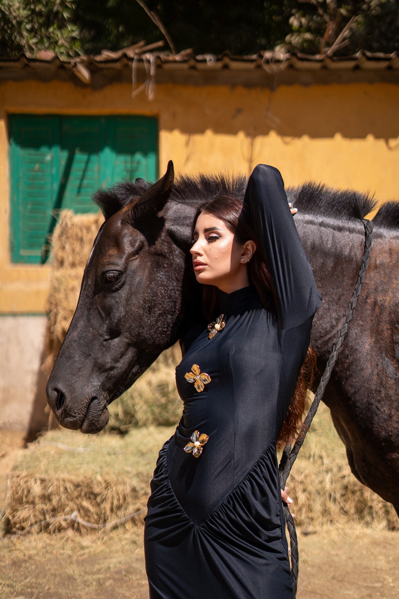 Black v waist dress with gold flowers