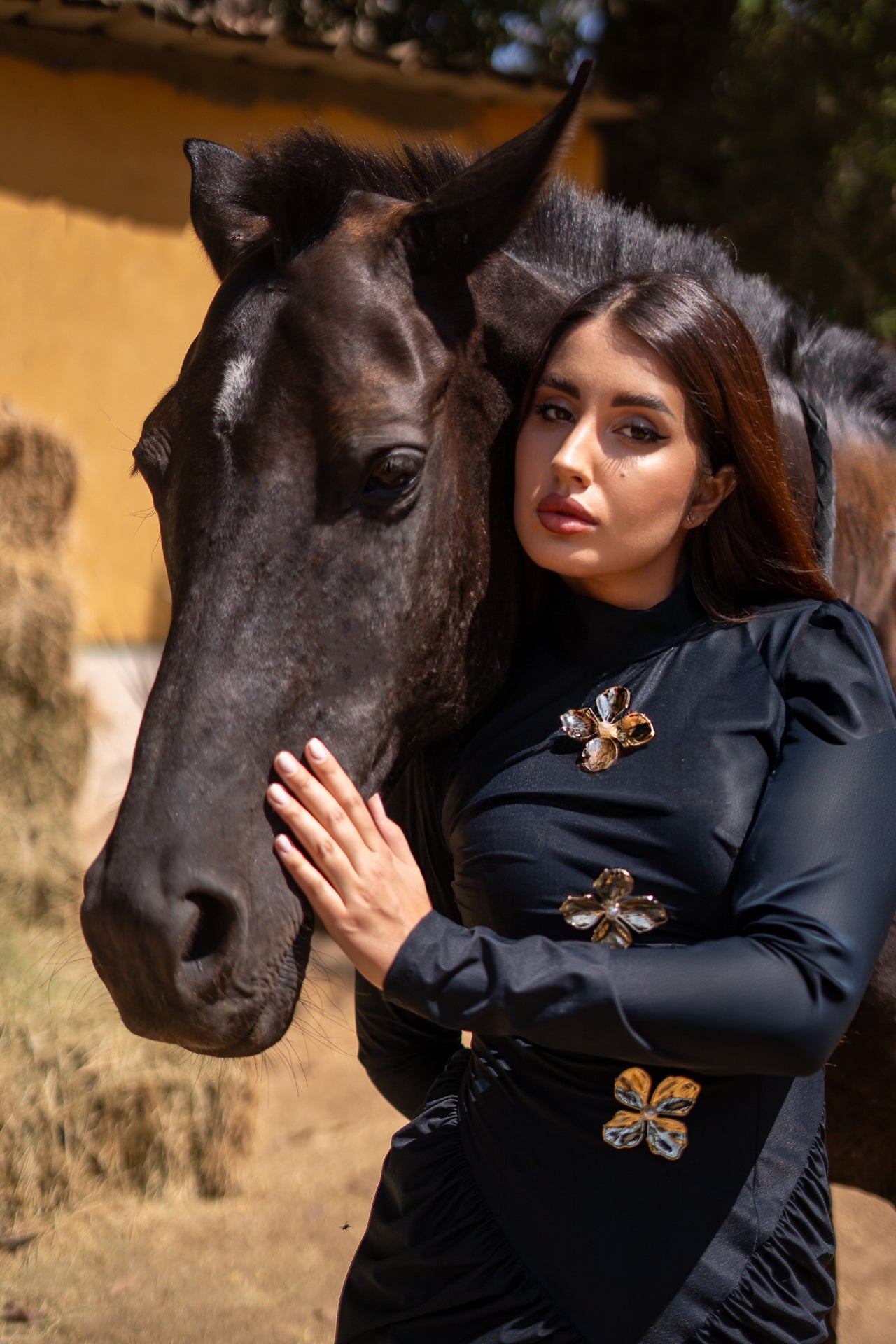 Black v waist dress with gold flowers
