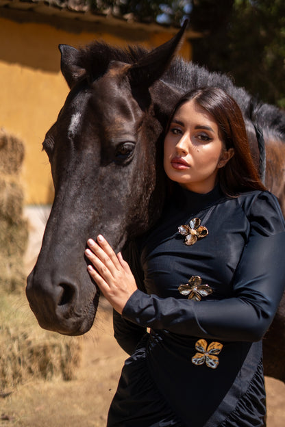 Black v waist dress with gold flowers